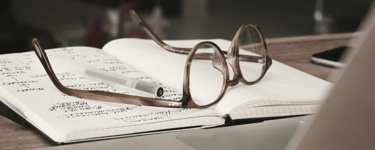 Glasses on the top of a ledger